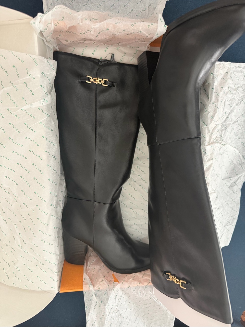 Unisa Black Knee-High Boots with Gold Hardware